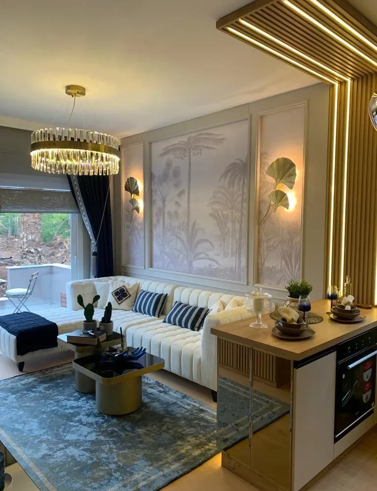 Studio apartment for sale in Mersin Kargipinari – exterior view of the residential complex with pool