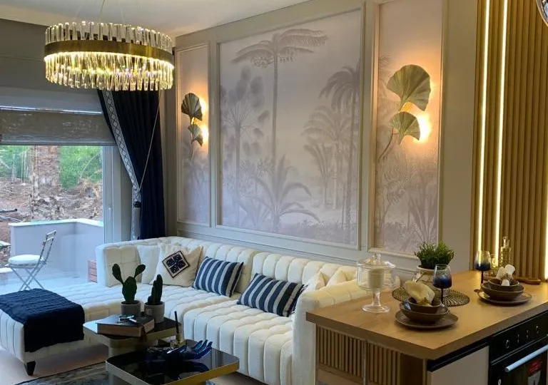 Studio apartment for sale in Mersin Kargipinari – exterior view of the residential complex with pool