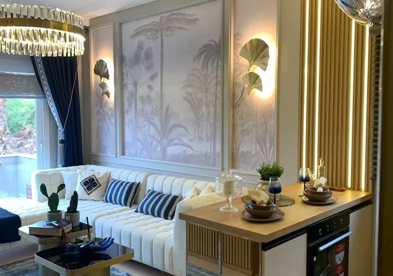 Studio apartment for sale in Mersin Kargipinari – exterior view of the residential complex with pool