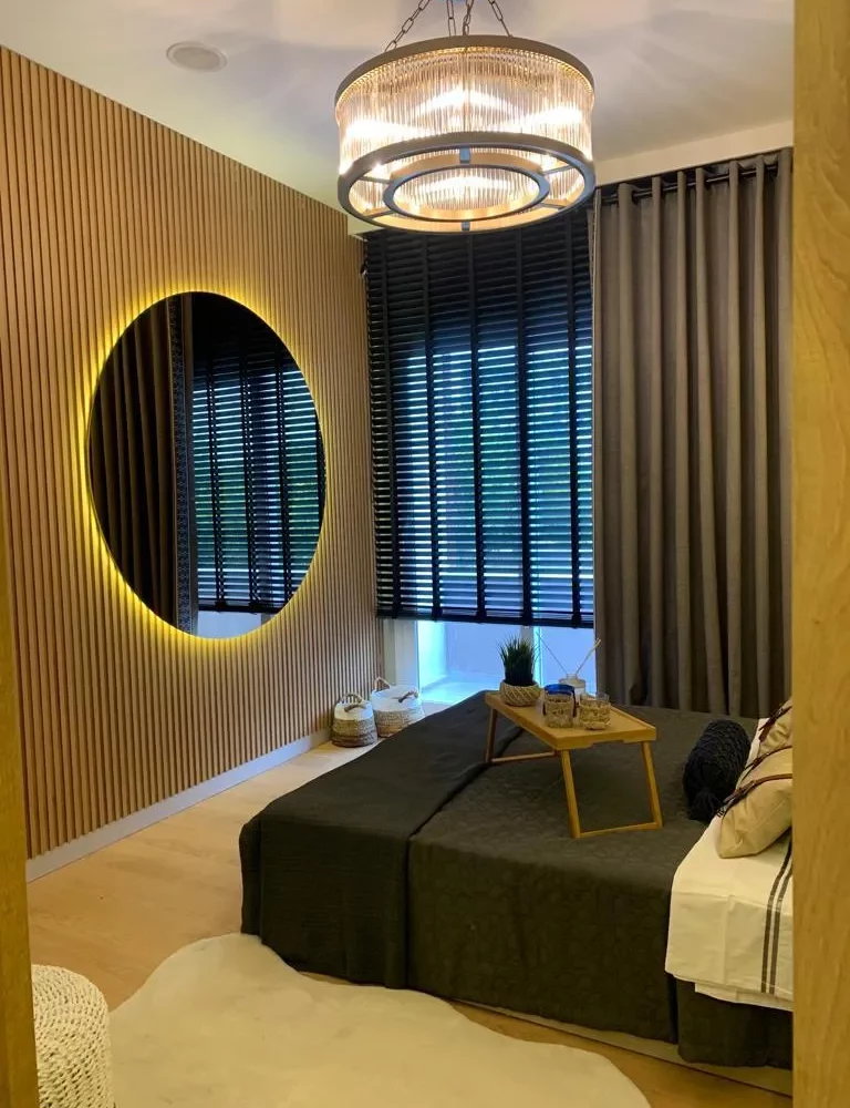 Studio apartment for sale in Mersin Kargipinari – exterior view of the residential complex with pool