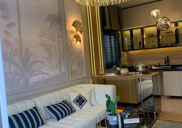 Studio apartment for sale in Mersin Kargipinari – exterior view of the residential complex with pool