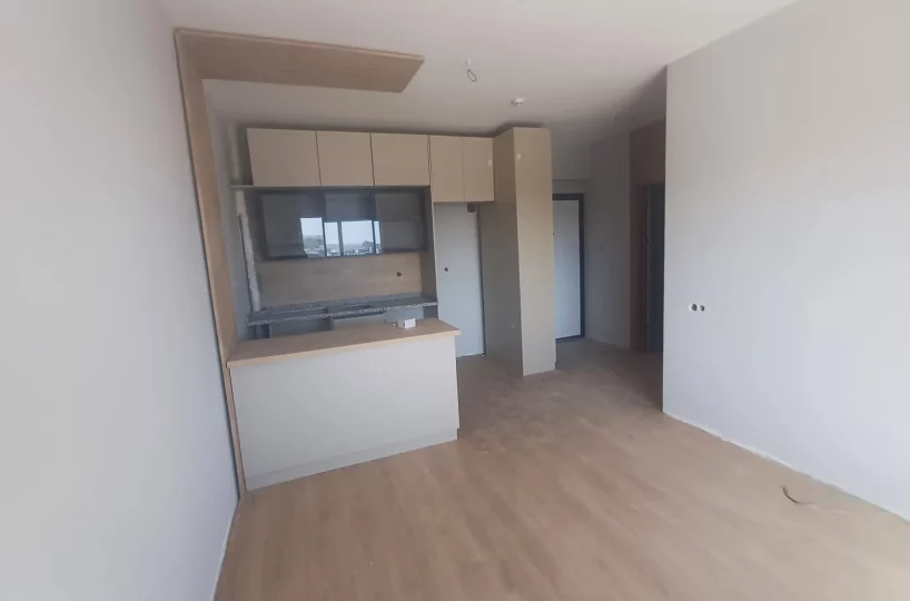 Two-room apartment for sale in Mersin Erdemli near sea – view of the nearby coastline 500m away
