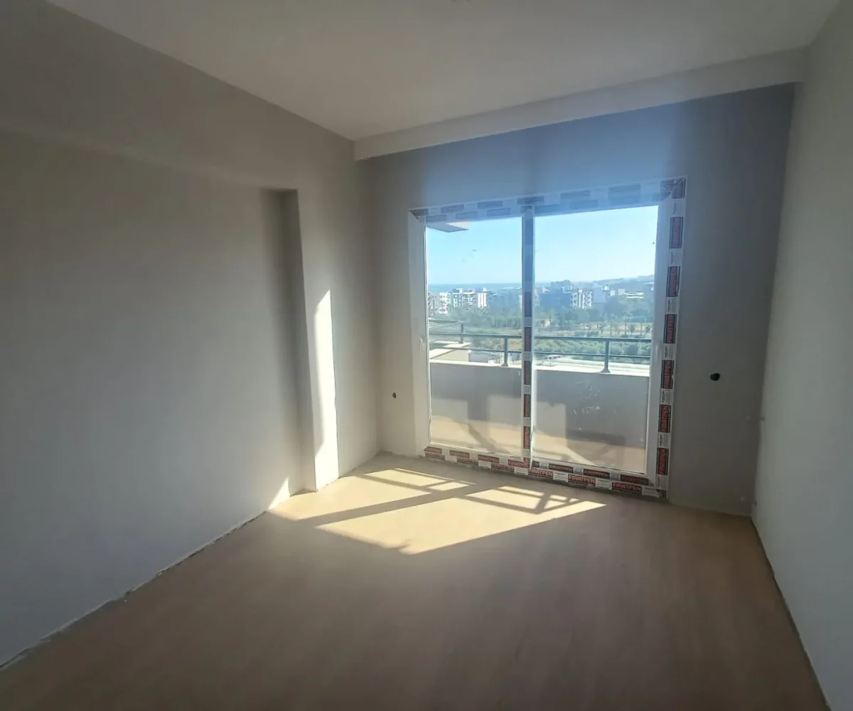 Two-room apartment for sale in Mersin Erdemli near sea – view of the nearby coastline 500m away