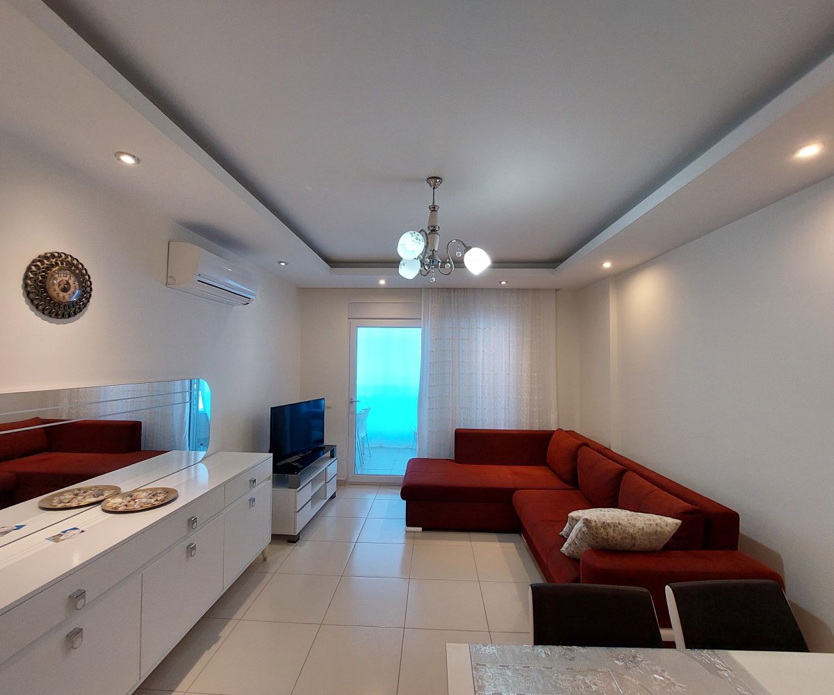 Fully furnished two-room apartment in Alanya Kestel for sale – cozy living room with practical design