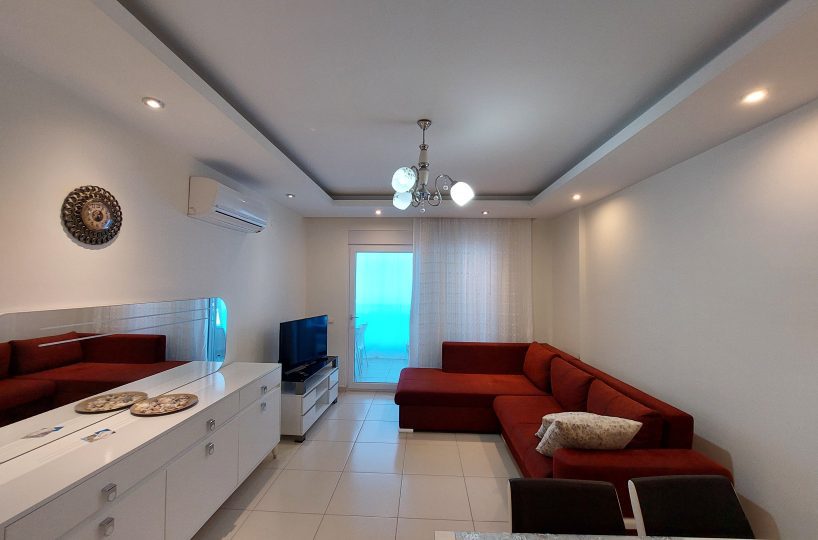 Fully furnished two-room apartment in Alanya Kestel for sale – cozy living room with practical design