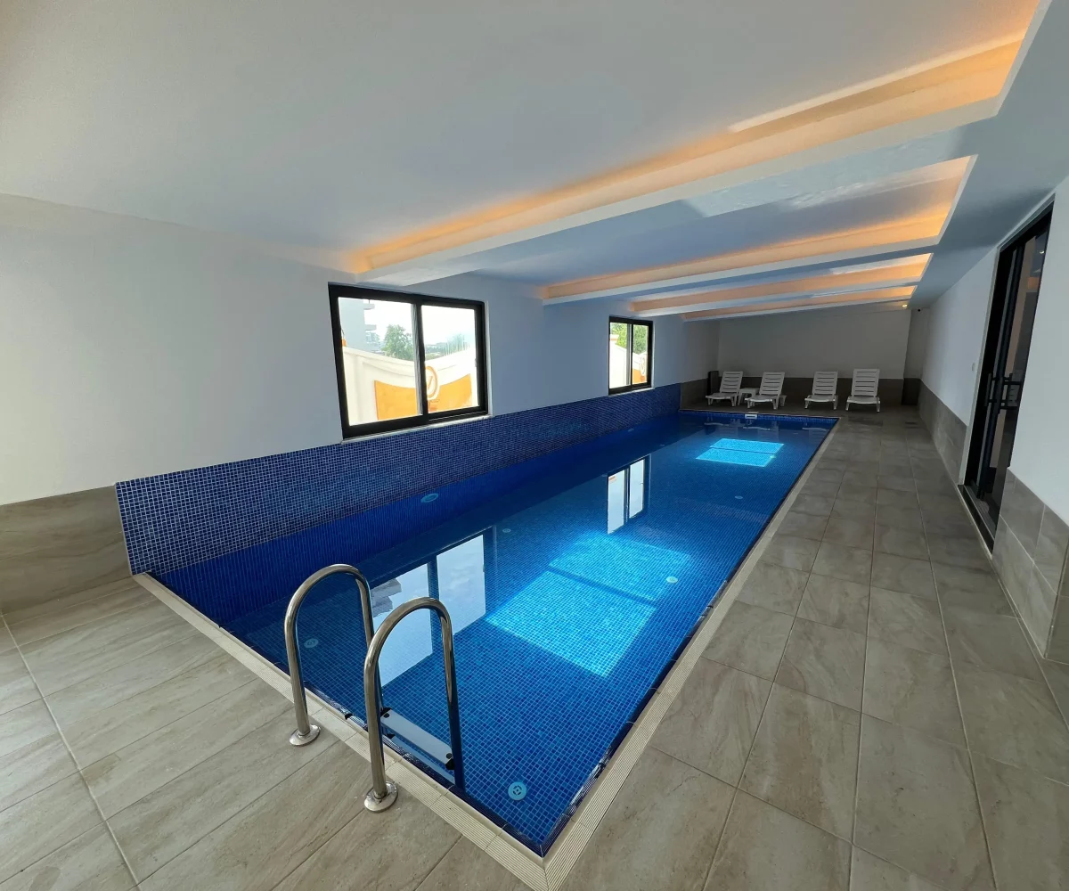 Two-bedroom apartment for sale in Mahmutlar Alanya – exterior view of the residential building in Mahmutlar