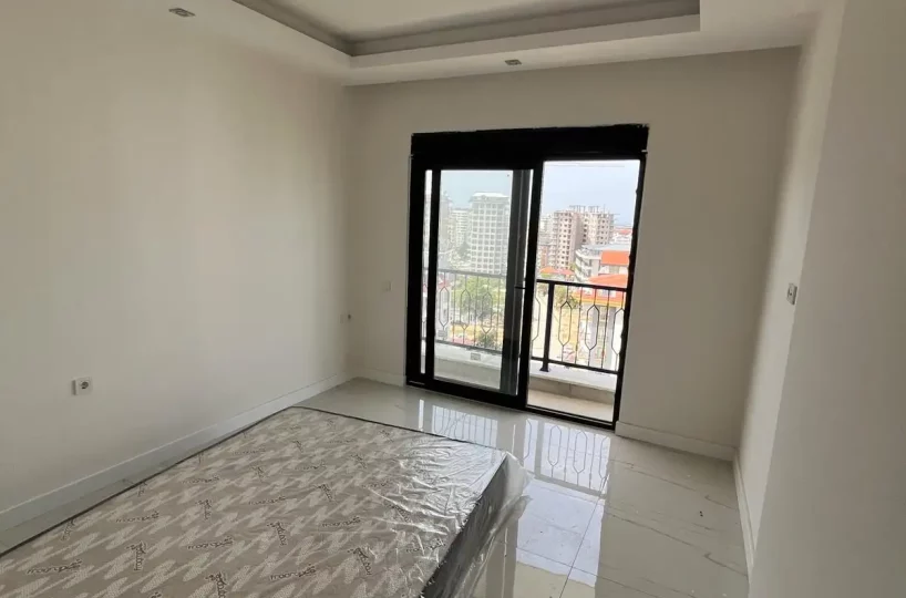 Two-bedroom apartment for sale in Mahmutlar Alanya – exterior view of the residential building in Mahmutlar