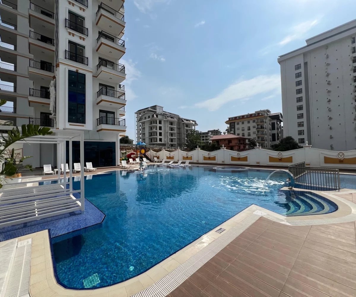 Two-bedroom apartment for sale in Mahmutlar Alanya – exterior view of the residential building in Mahmutlar