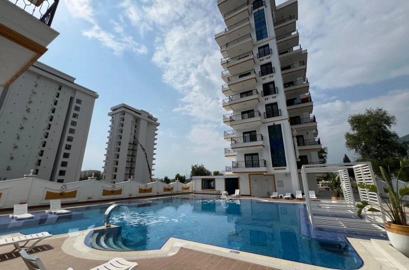 Two-bedroom apartment for sale in Mahmutlar Alanya – exterior view of the residential building in Mahmutlar