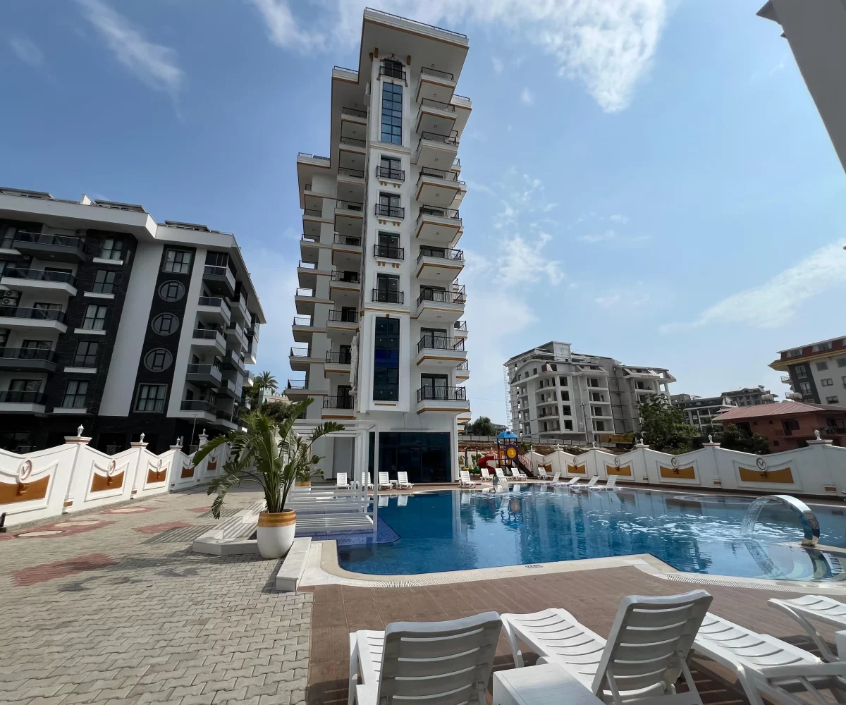 Two-bedroom apartment for sale in Mahmutlar Alanya – exterior view of the residential building in Mahmutlar