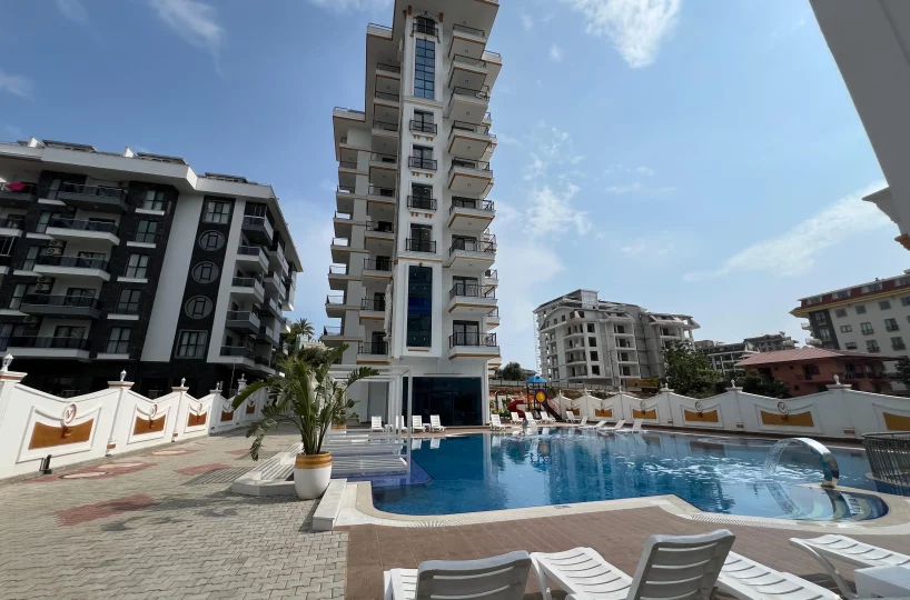 Two-bedroom apartment for sale in Mahmutlar Alanya – exterior view of the residential building in Mahmutlar