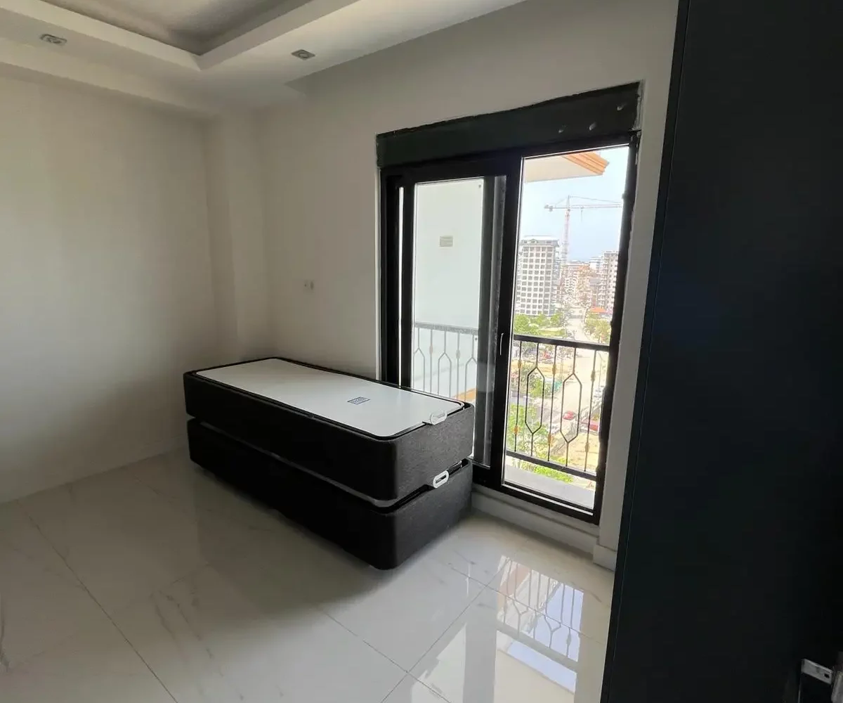 Two-bedroom apartment for sale in Mahmutlar Alanya – exterior view of the residential building in Mahmutlar