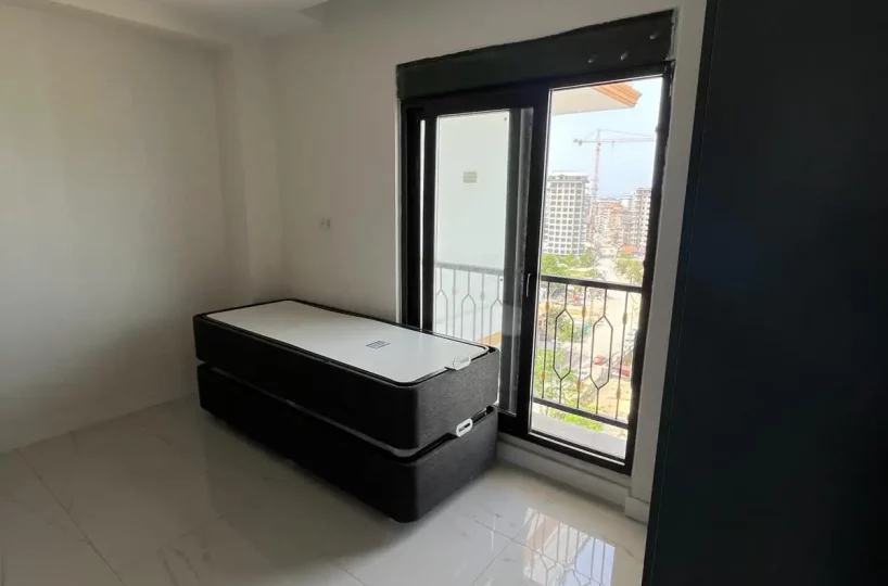Two-bedroom apartment for sale in Mahmutlar Alanya – exterior view of the residential building in Mahmutlar