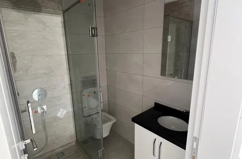 Two-bedroom apartment for sale in Mahmutlar Alanya – exterior view of the residential building in Mahmutlar