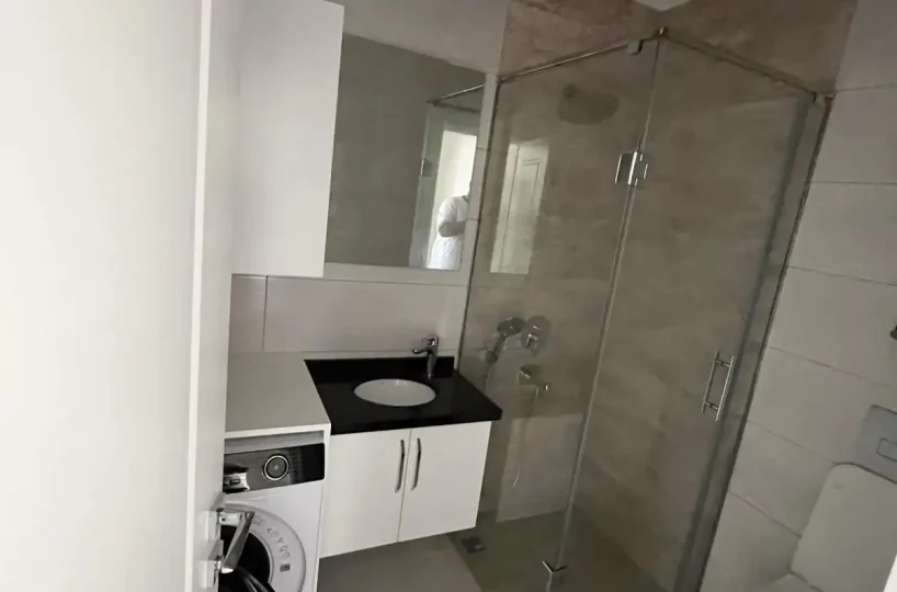 Two-bedroom apartment for sale in Mahmutlar Alanya – exterior view of the residential building in Mahmutlar