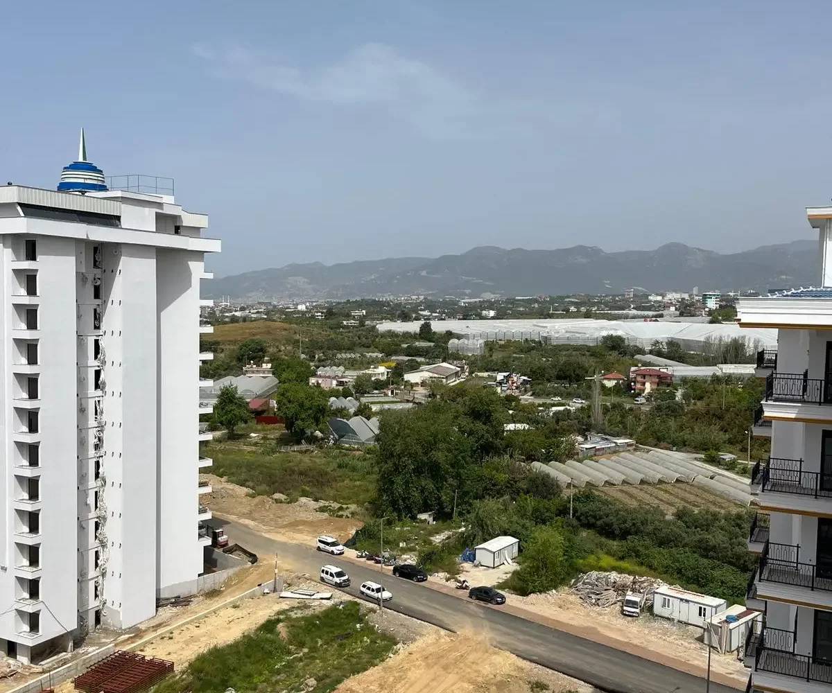 Two-bedroom apartment for sale in Mahmutlar Alanya – exterior view of the residential building in Mahmutlar