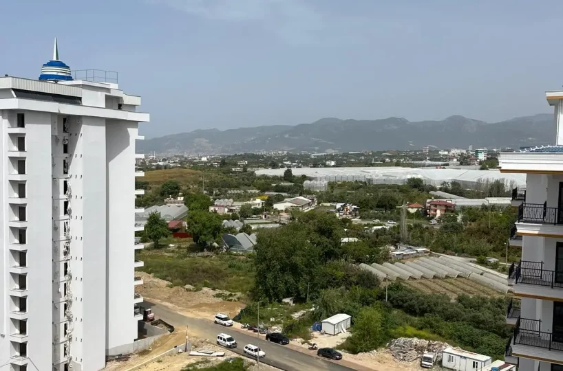 Two-bedroom apartment for sale in Mahmutlar Alanya – exterior view of the residential building in Mahmutlar