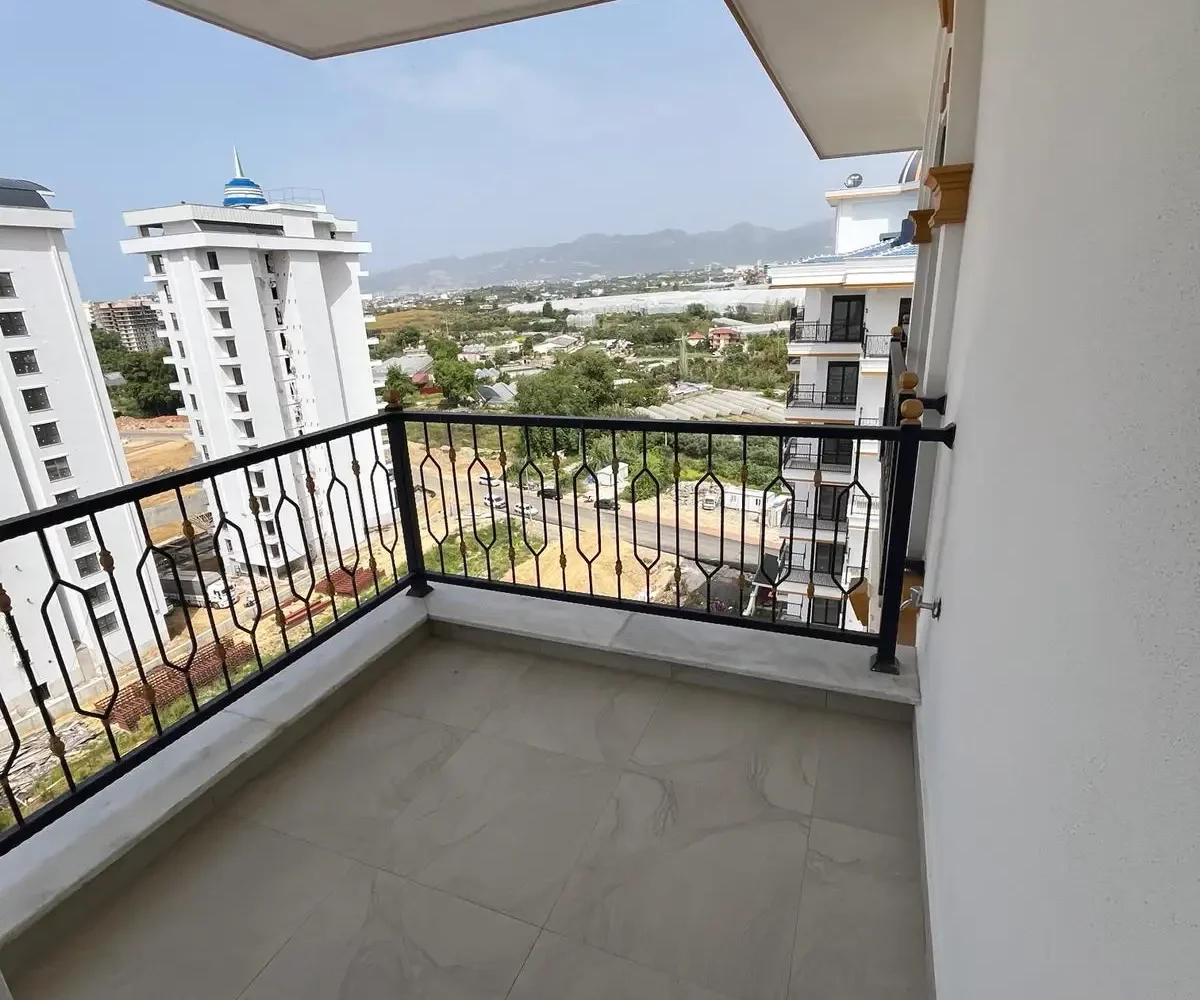 Two-bedroom apartment for sale in Mahmutlar Alanya – exterior view of the residential building in Mahmutlar