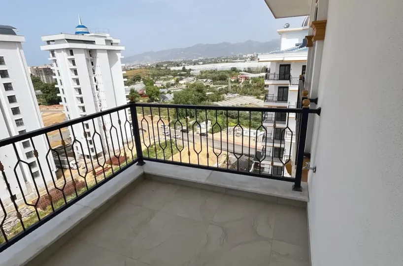 Two-bedroom apartment for sale in Mahmutlar Alanya – exterior view of the residential building in Mahmutlar